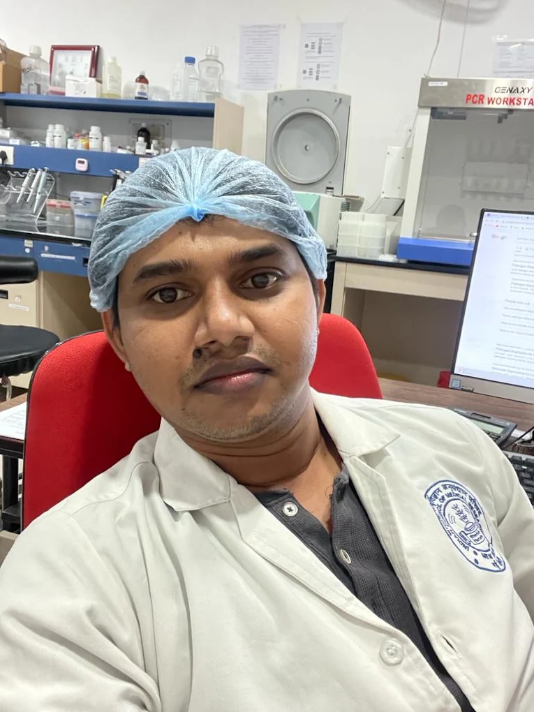 Pathogen Diagnostics laboratory team member in the laboratory near PCR workstation